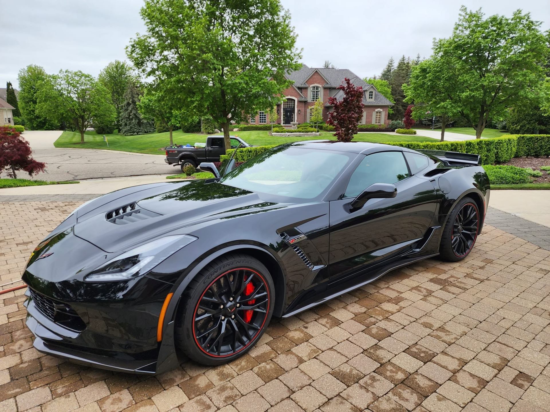 Freshly detailed luxury vehicle with water beading by Lakes Detailing